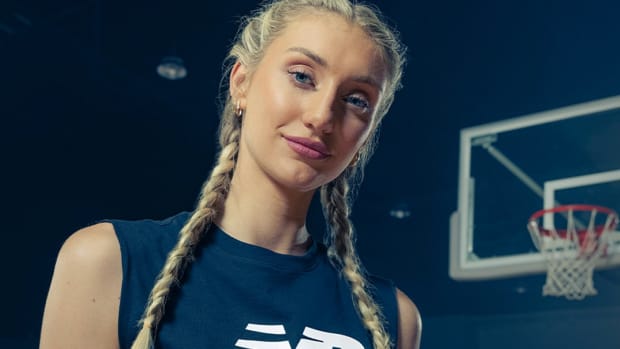 Cameron Brink models New Balance basketball apparel.